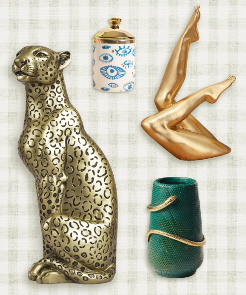 Eclectic whimsical home decor featuring a gold panther statue, evil eye jar, gold sculpture legs, and green snake vase