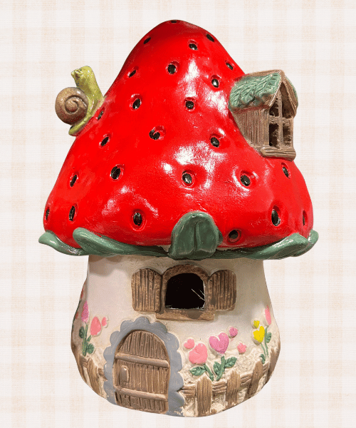 Whimsical strawberry fairy garden house from HomeGoods